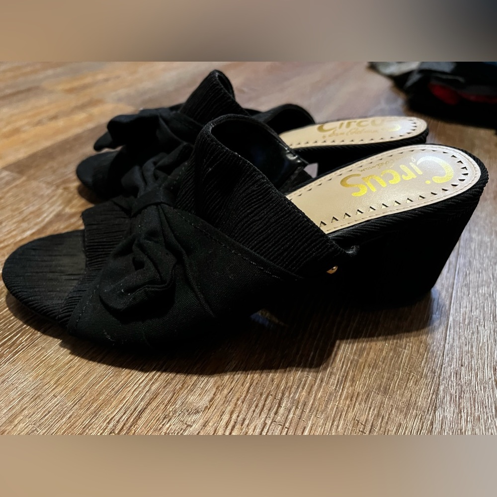 Black slip on block heels.
